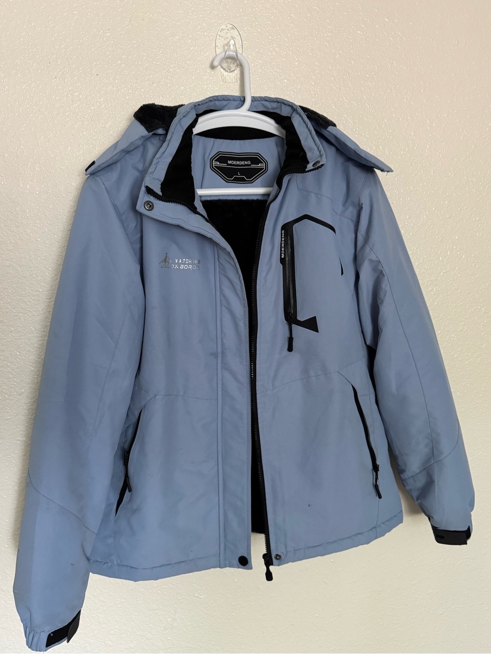 Light Blue Ski Jacket with Black Trim